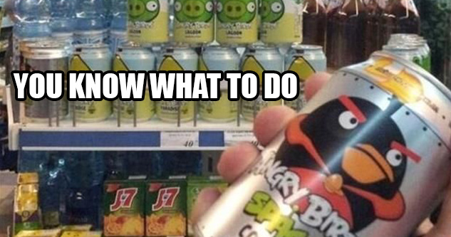 Man holds a can of Angry Birds soda. In the background is a stacked pyramid of green pig sodas. text on image reads: You know what to do.