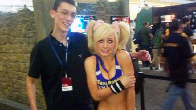 guy with hover hand over blonde girl in sports bra