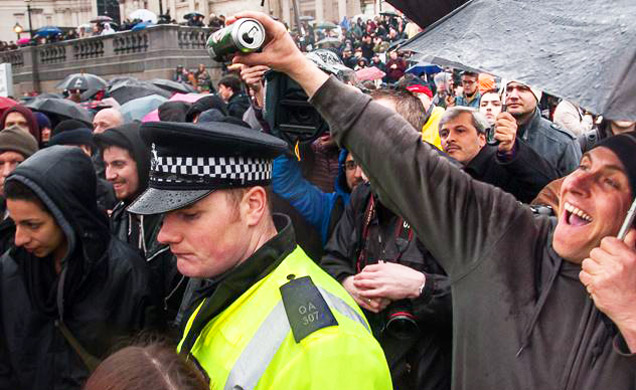 guy pouring beer on cops' head