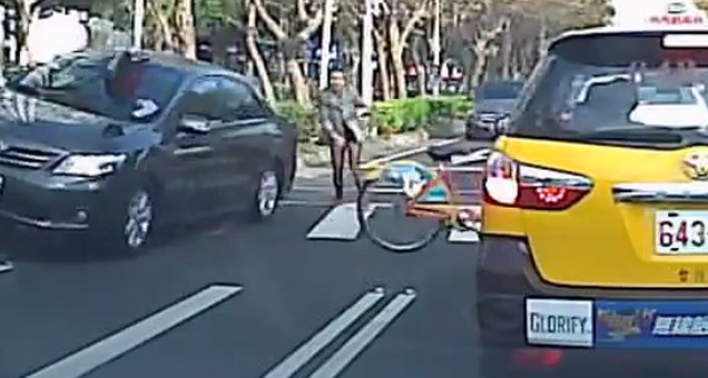 woman on bike hit by car bike goes flying