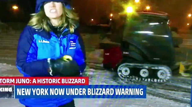 snow plow does donuts during broadcast