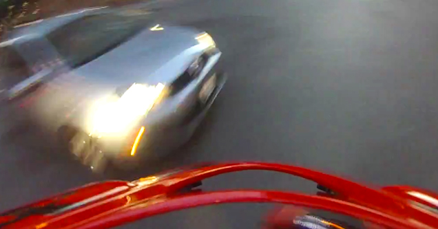 car about to hit motorcycle