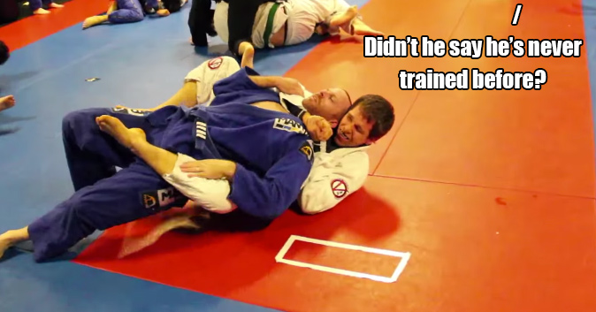 Pictured: A white belt choking out a blue belt. Text: Didn't he say he's never trained before?