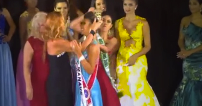 Runner-up in beauty pageant rips the crown off the winner.