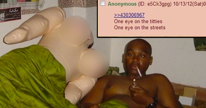 Cross-eyed guy in a bed next to a blow-up doll. Caption One eye on the titties. One eye on the streets.