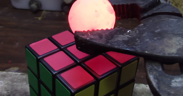 red hot nickel ball on rubiks cube