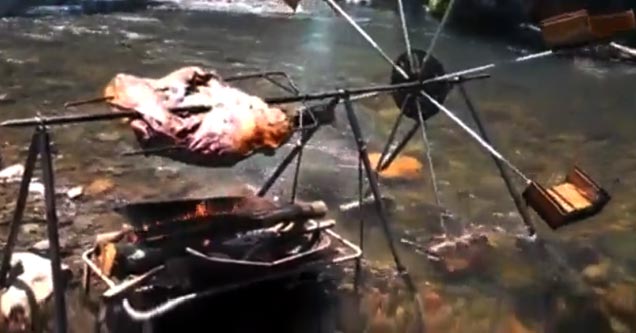 water powered rotisserie by the river