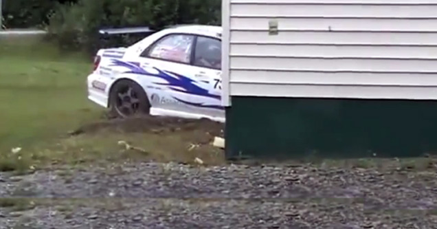 subaru crashes into house