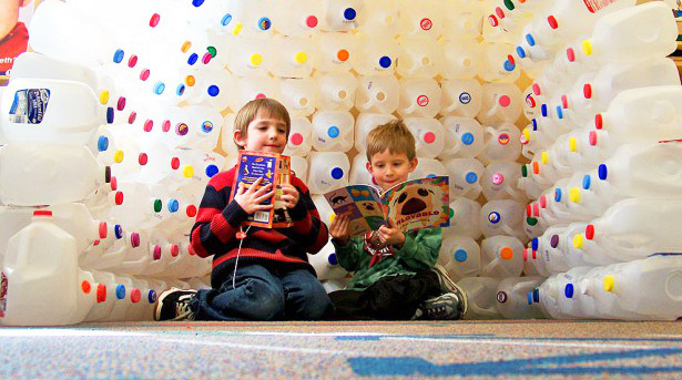 kids in igloo made of empty bottles