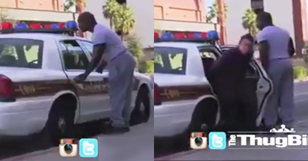 a man opening the door for a kid in the back of a cop car