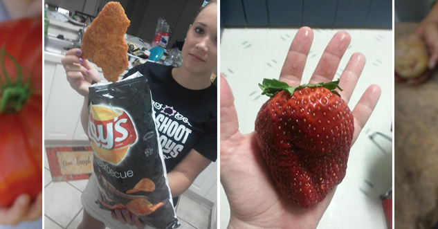 woman holding a giant lays chip. man holding a giant strawberry the size of a human heart.