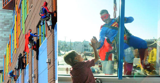 window cleaners dressed as superheroes