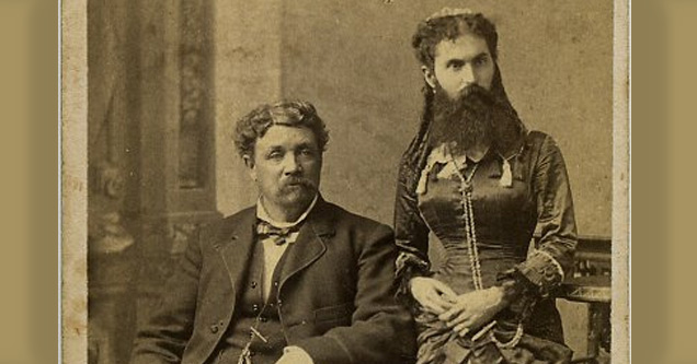 old timey photo of man and bearded wife