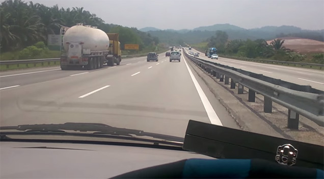 dashcam films as car drives down highway