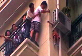 The three-year-old boy fell from the eighth floor balcony.