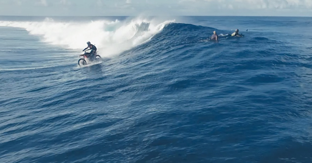 Dude Surfs a Wave on a Dirt Bike