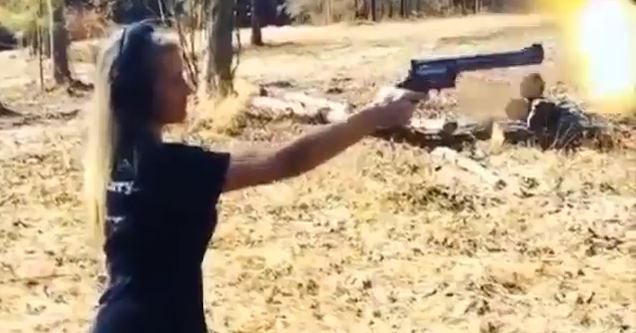 Girl Handles Huge Gun Well!