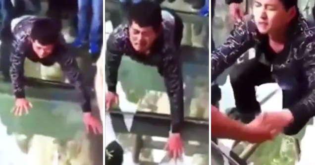 See-Through Skywalk In China Becomes Nightmare Crossing for Terrified Man