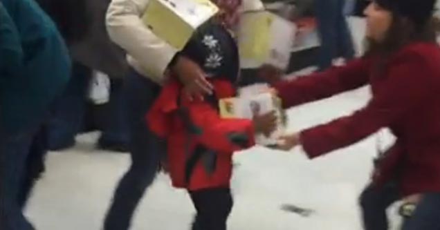 Woman Steals From Child During Black Friday Madness