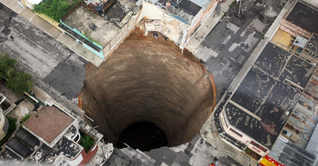 large hole in the middle of a city