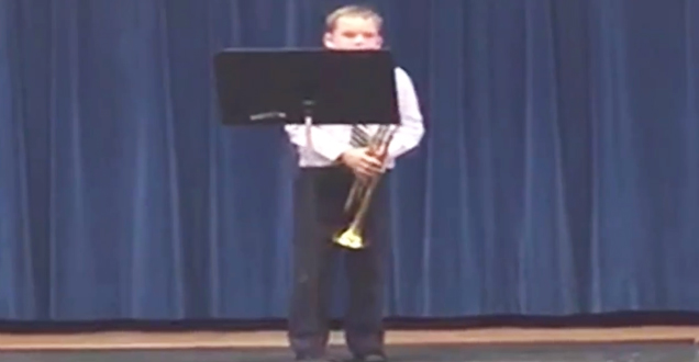 Kid Celebrates Amazing Trumpet Solo