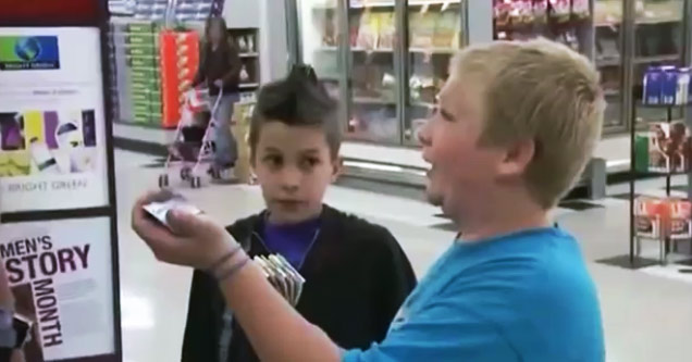 two kids talking to a police officer