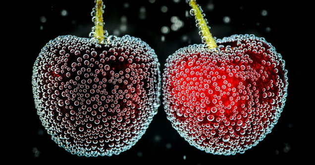 cherries covered in water droplets