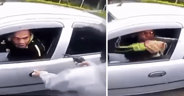 man in car being threatened by gun holding car thief then pulling a gun out himself