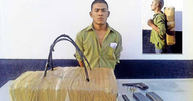 guy in khaki shirt and ammunition