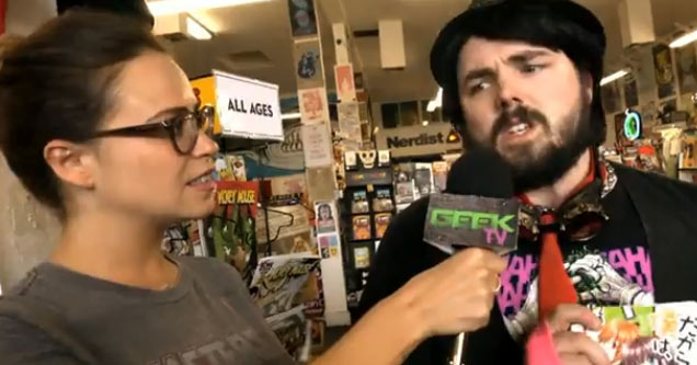 awkward guy being interviewed at comic book store