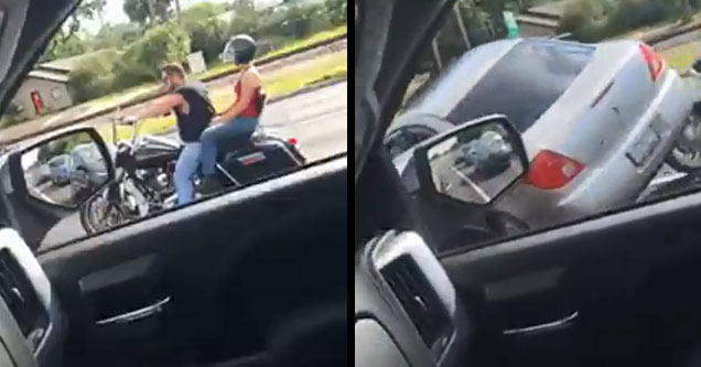 couple on a motorcycle being run over by a car