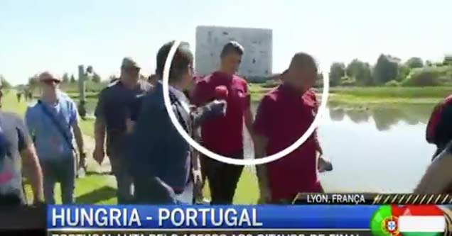 Ronaldo splashes water on TV reporter 