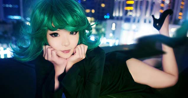 green haired woman posing for the camera