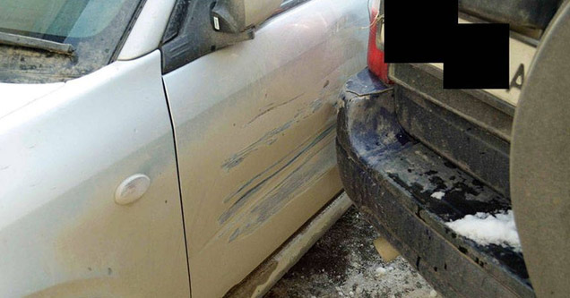 A Russian man was at the grocery store when he noticed someone had backed into his vehicle.