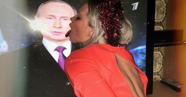 woman licking a photo of putin