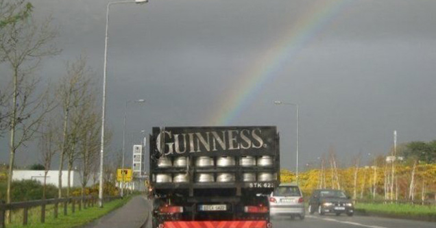 awesome pics - rainbow coming out of Guinness beer truck