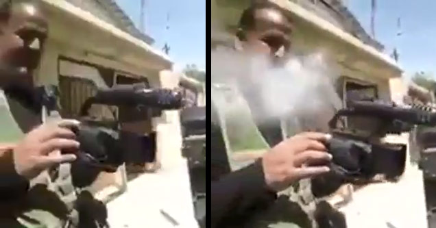 man holding camera almost hit by sniper bullet in mosul