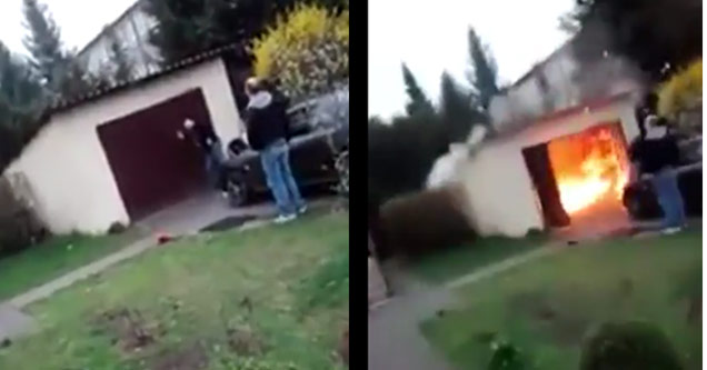 man holding garage doors closed experiences a sudden explosion