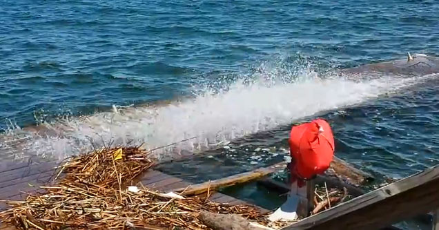 ocean dock with water splash