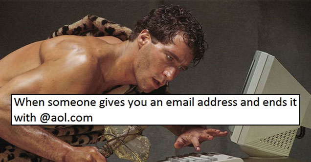 funny picture meme of caveman at the computer as how it feels when someone gives you an email address with ending in aol.com