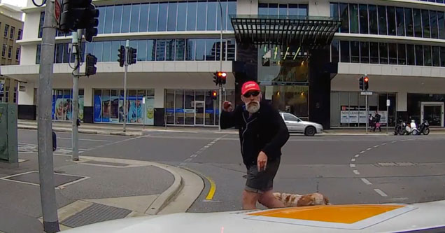 angry pedestrian yelling at a driver