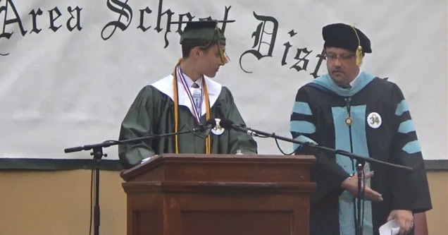 school principal telling student to get off stage during graduation