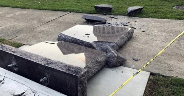 a 10 commandments statue that was knocked over by a car and smashed