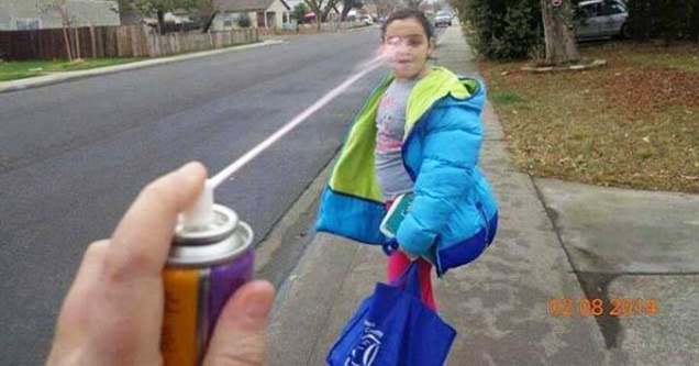 girl getting sprayed in the face with silly string