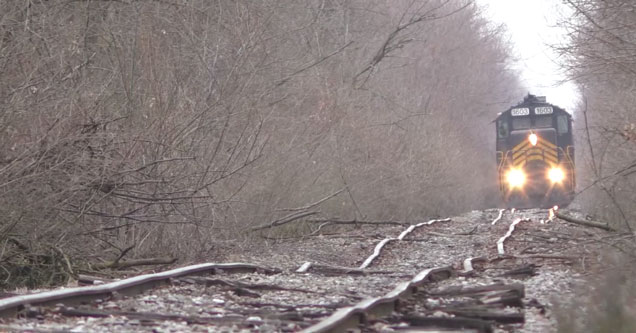 Train riding down a set of extremely crooked tracks