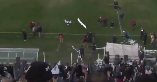 Perfectly Thrown Toilet Paper Roll Takes Out A Drone At A Soccer Game