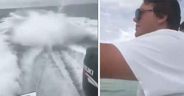 assholes film themselves drag a shark behind their boat