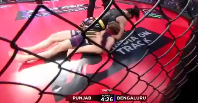 Cornerman Jumps Into The Cage to Save Fighter from Terrible Referee