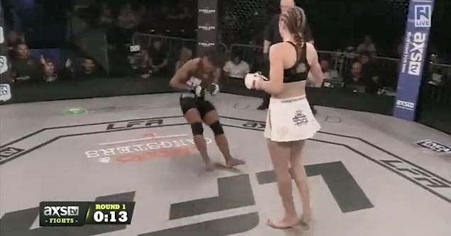 A Swift Kick To The Head  Leaves Her Opponent Stiff As A Board