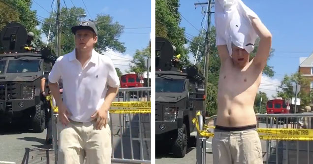 white supremacist seen removing his shirt when hes confront in Charlottesville